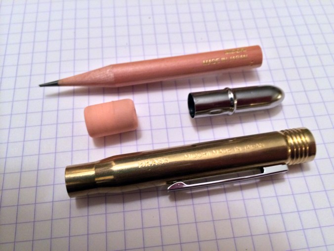 The four components that make up the Midori brass bullet pencil. Simple and high-quality.
