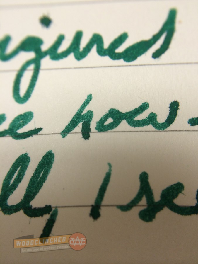 Closeup of a medium-nib fountain pen ink in Blackwing Slate